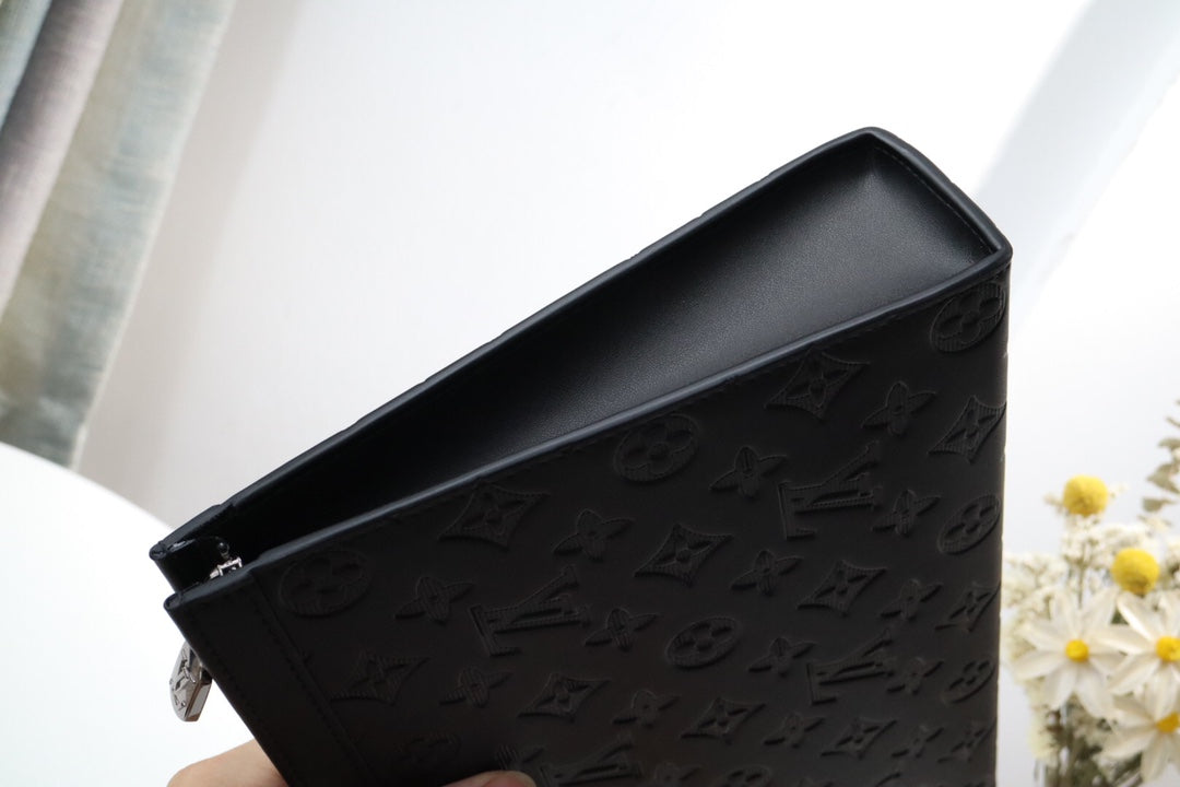 Louis Vuitton Elegant Black Embossed Monogram Leather Zip Clutch Pouch