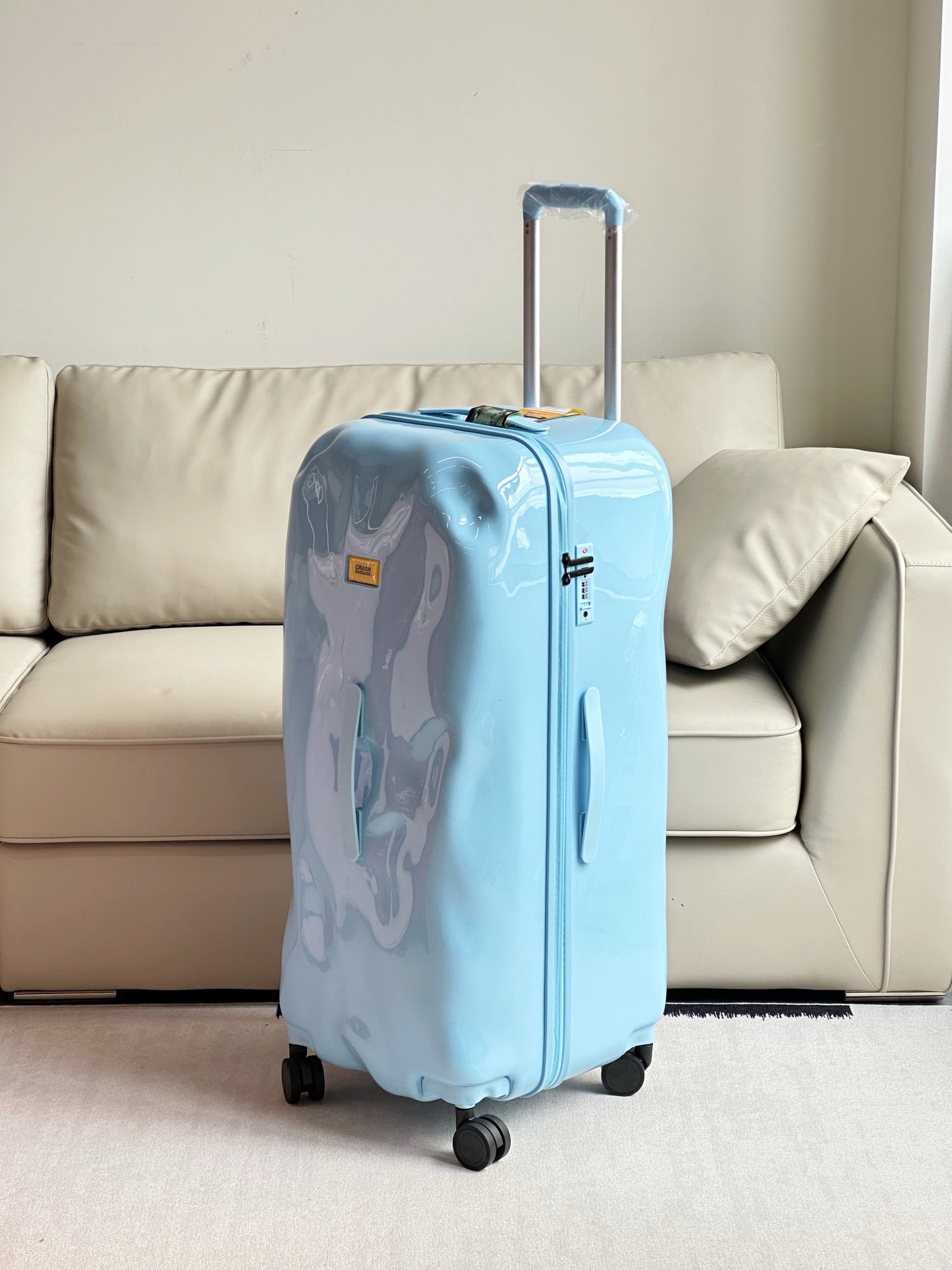 Modern Light Blue Dented Hardshell Spinner Luggage