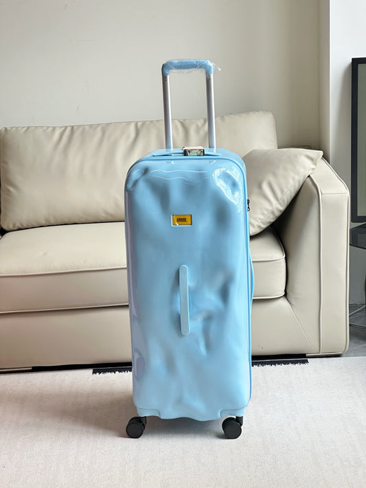 Modern Light Blue Dented Hardshell Spinner Luggage