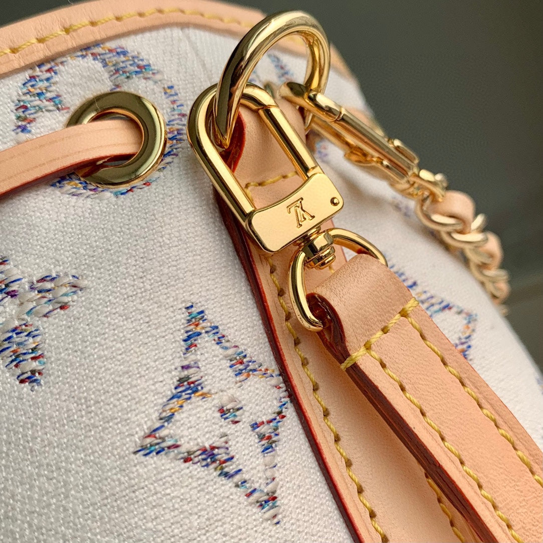 Louis Vuitton Luxury White Monogram Mini Bucket Bag with Gold Chain and Leather Trim