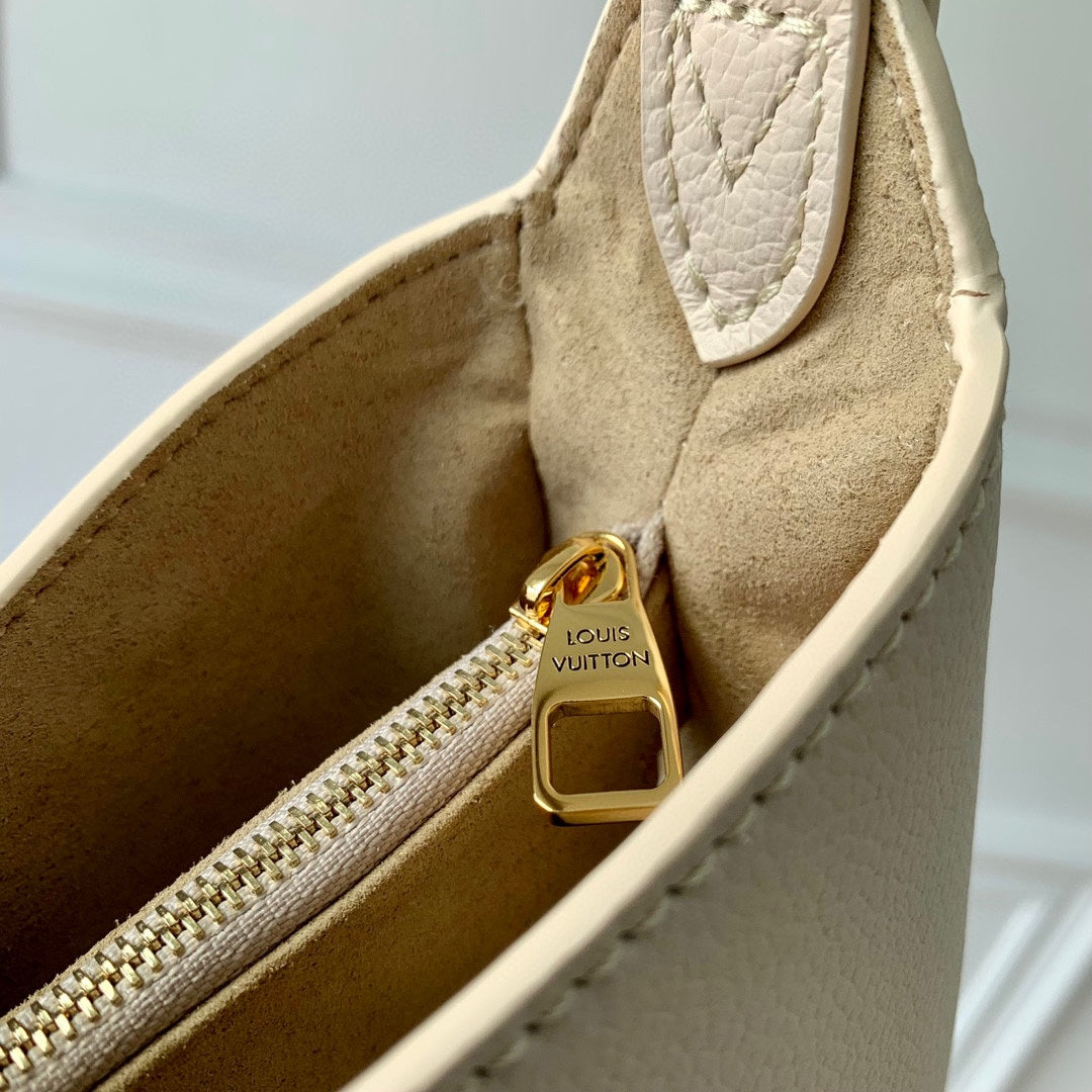 Louis Vuitton Elegant Cream Leather Crescent Shoulder Bag with Gold Lock