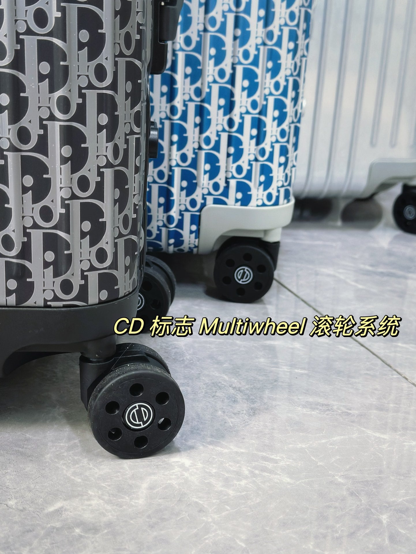Silver Aluminum Hardside Spinner Suitcase with Monogram Pattern