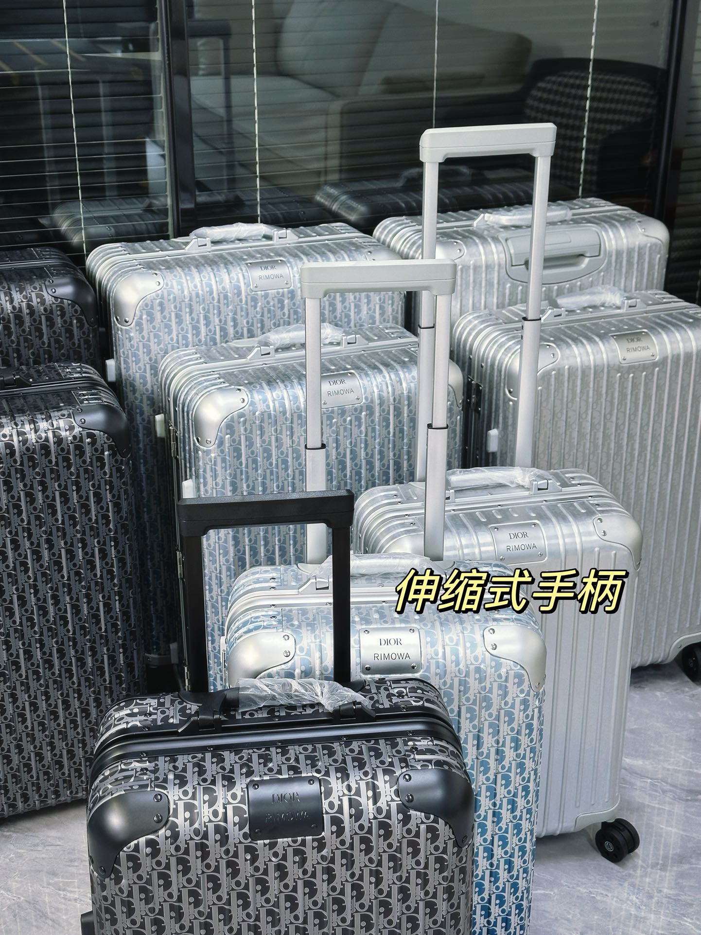 Silver Aluminum Hardside Spinner Suitcase with Monogram Pattern