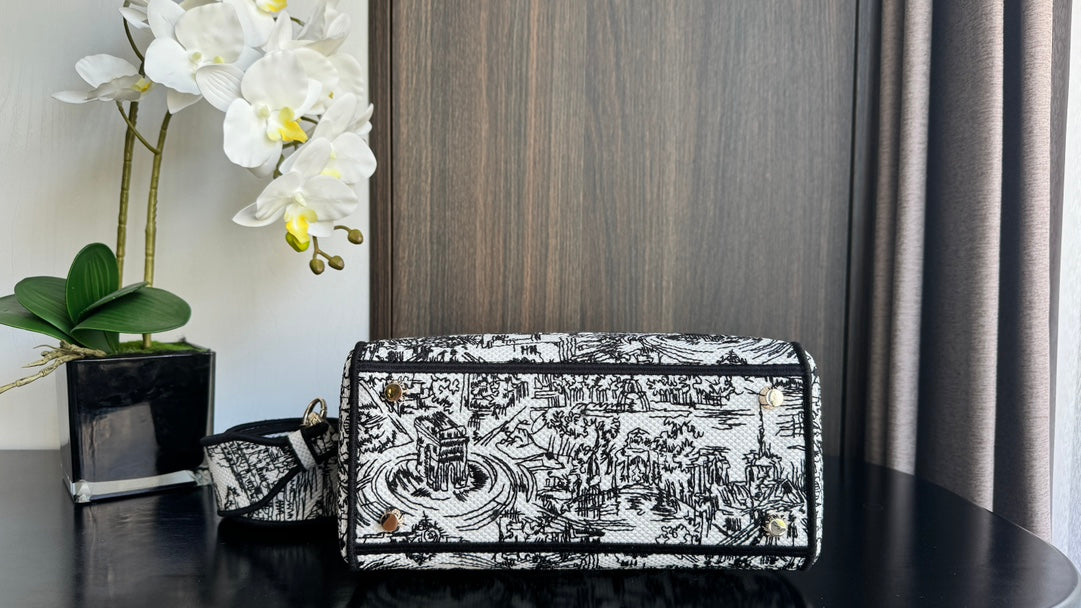 Dior Elegant Black and White Embroidered Canvas Top-Handle Handbag