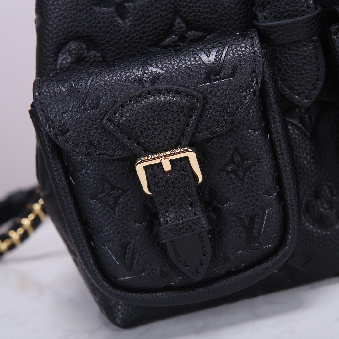 Louis Vuitton Luxury Black Embossed Leather Backpack with Gold Buckles