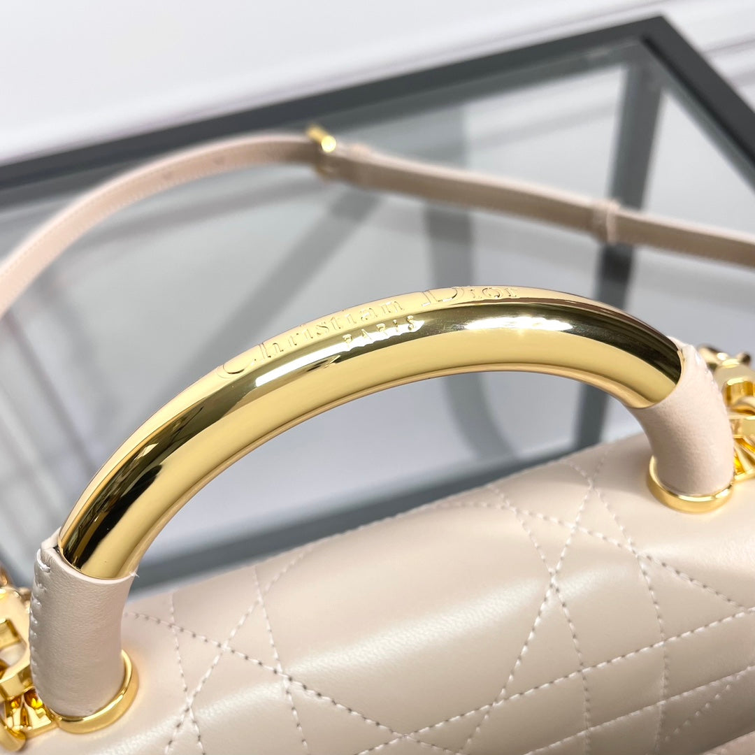 Dior Elegant Beige Quilted Leather Top Handle Bag with Gold Chain Strap
