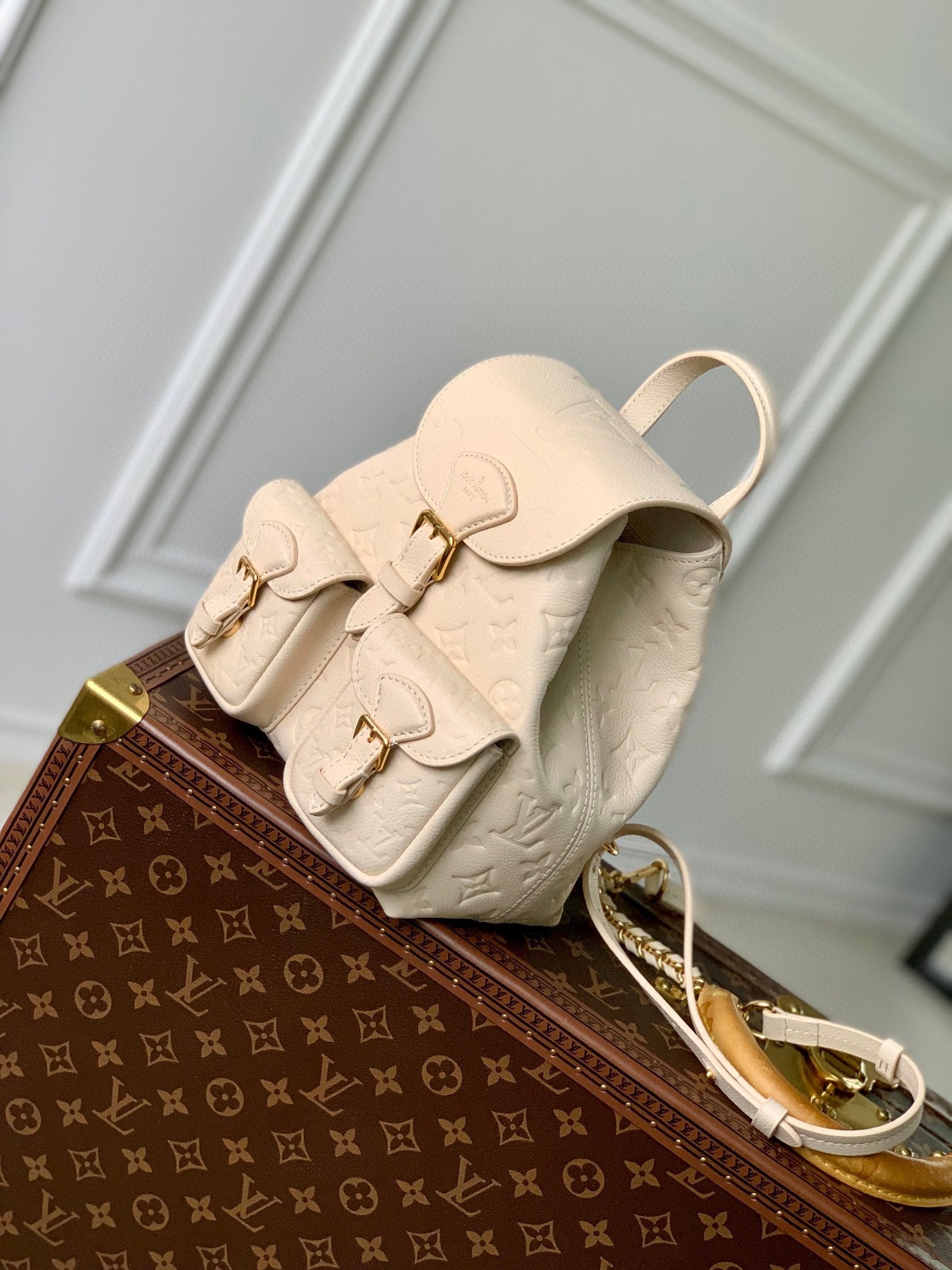 Louis Vuitton Off-White Embossed Leather Mini Backpack with Front Pockets