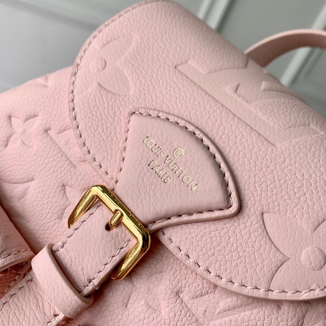 Louis Vuitton Pastel Pink Embossed Leather Mini Backpack with Gold Buckles