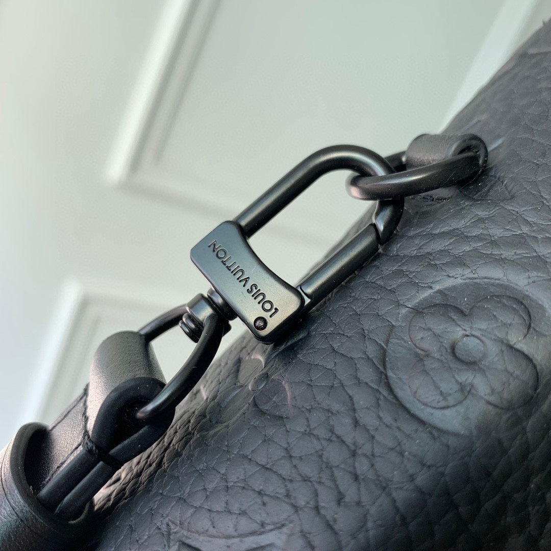 Louis Vuitton Matte Black Embossed Leather Mini Backpack Crossbody Bag with Chain Detail