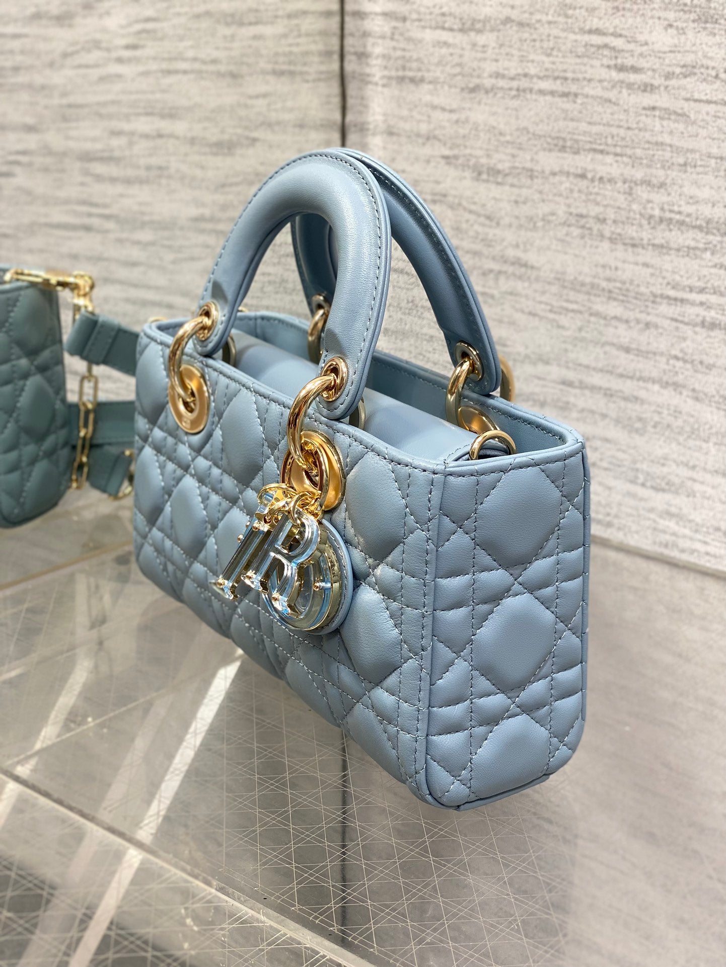 Dior Elegant Light Blue Quilted Leather Crossbody Bag with Top Handle