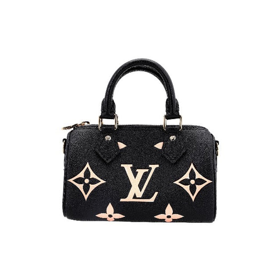 Louis Vuitton Elegant Black Mini Barrel Handbag with Gold Monogram Motifs