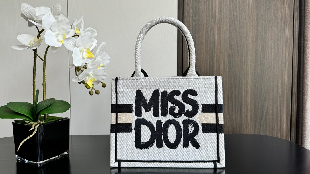 Dior Canvas Top Handle Tote Bag with Black Graffiti Graphic Print