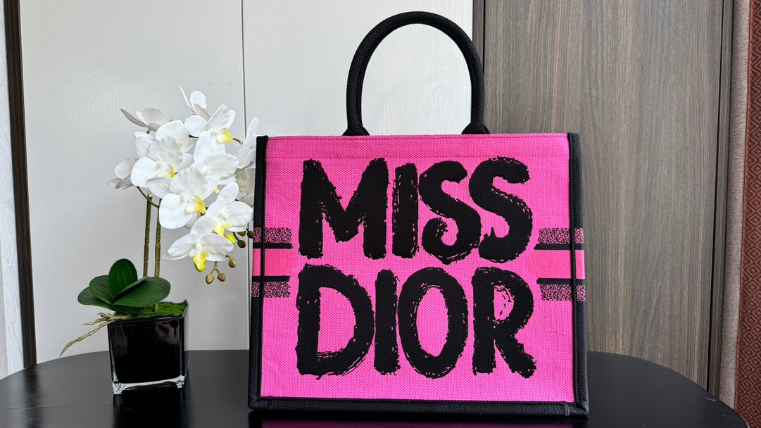 Dior Hot Pink Canvas Tote Handbag with Bold Black Graffiti Print