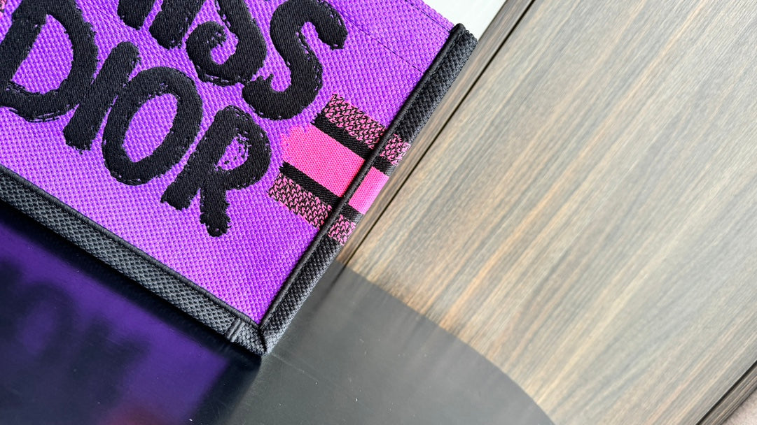 Dior Vibrant Pink Canvas Tote Bag with Bold Black Lettering and Top Handles