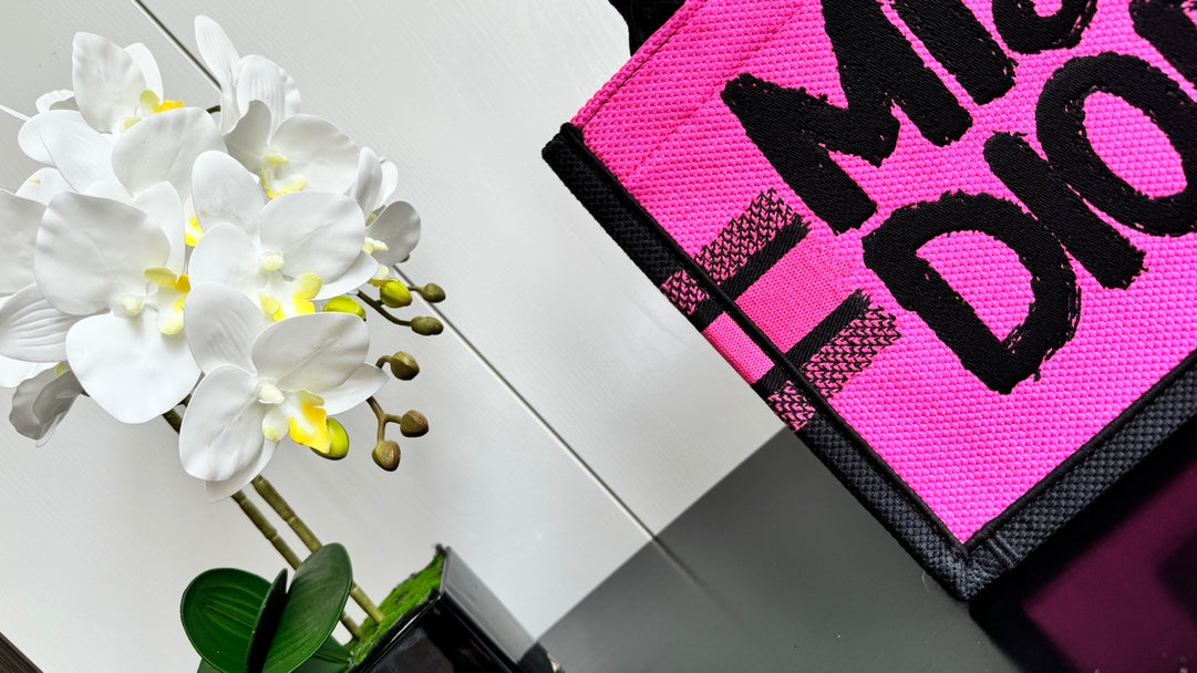 Dior Vibrant Pink Canvas Tote Bag with Bold Black Lettering and Top Handles