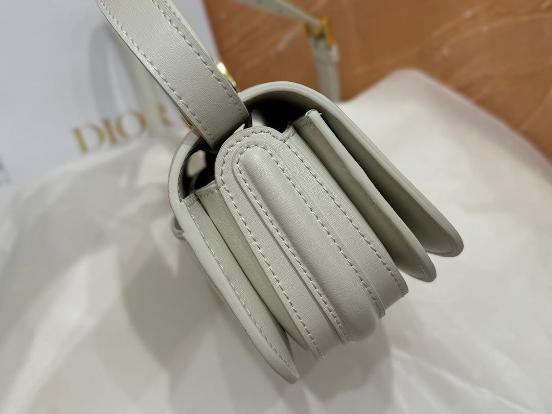 Dior Elegant Off-White Leather Top Handle Crossbody Bag with Gold Buckle