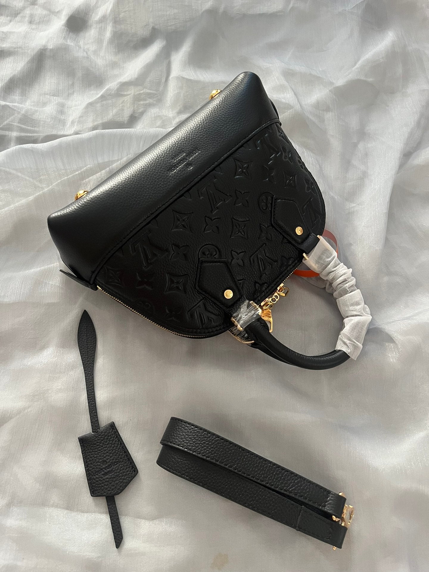 Louis Vuitton Luxury Black Embossed Leather Dome Top-Handle Handbag