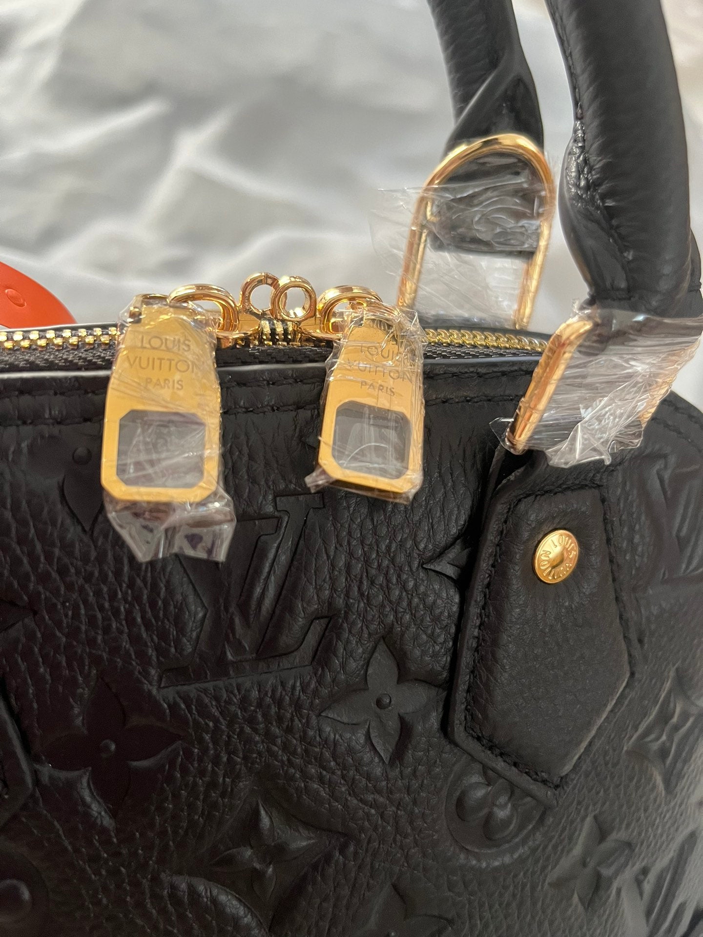 Louis Vuitton Luxury Black Embossed Leather Dome Top-Handle Handbag