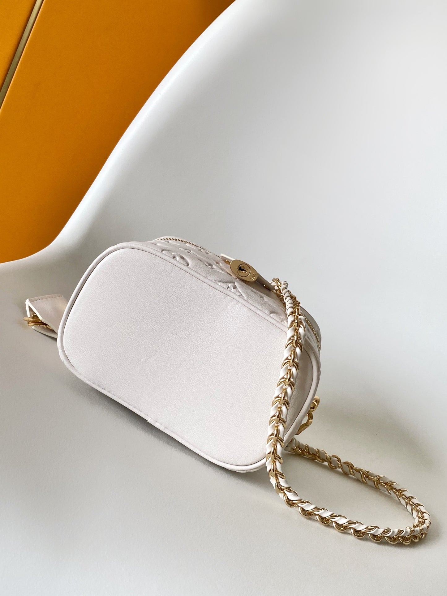 Louis Vuitton Elegant Off-White Embossed Leather Vanity Case Handbag
