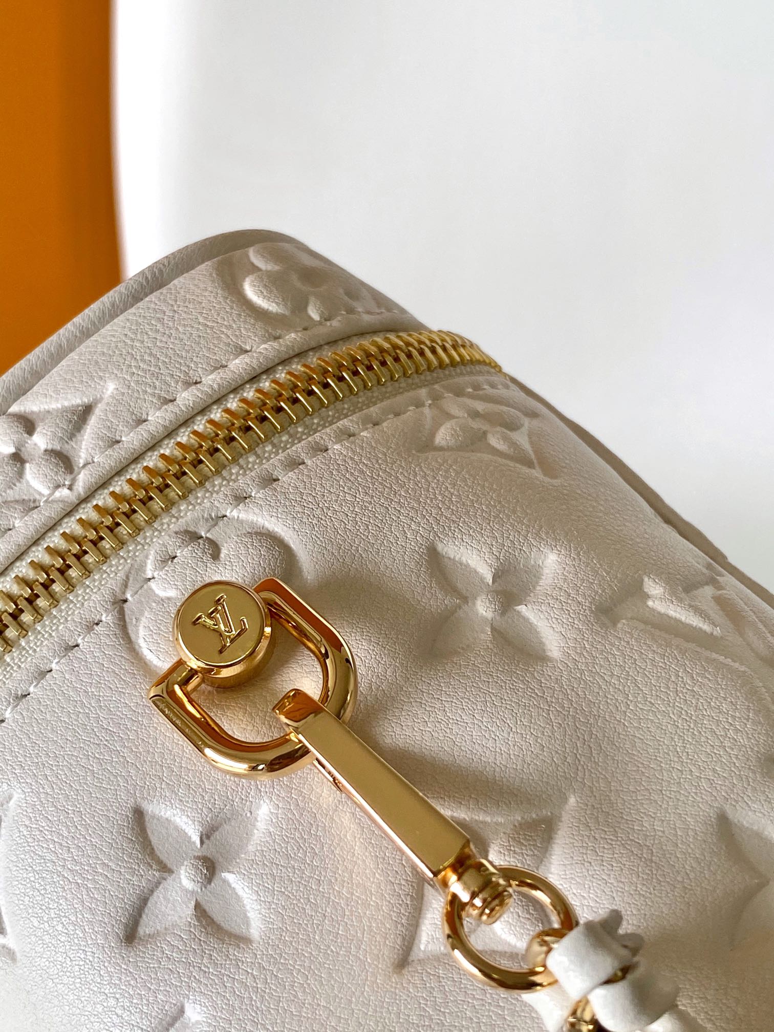 Louis Vuitton Elegant Off-White Embossed Leather Vanity Case Handbag