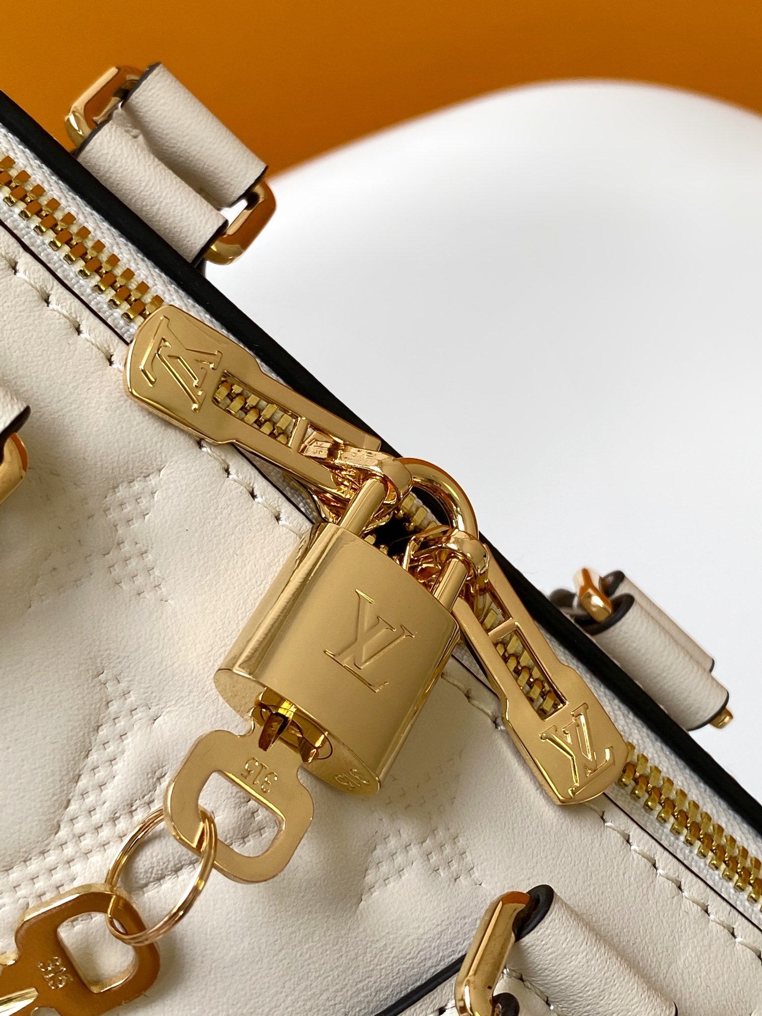 Louis Vuitton White Embossed Leather Top Handle Mini Crossbody Duffle Bag