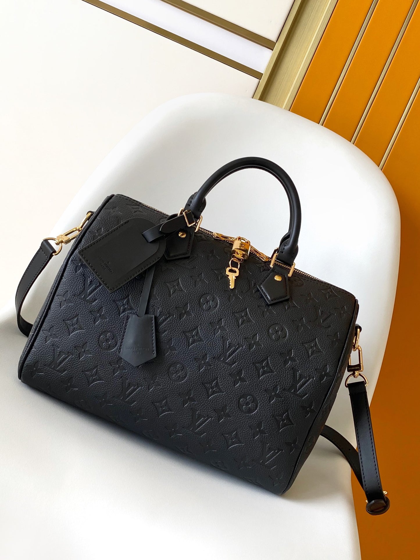 Louis Vuitton Black Embossed Leather Duffle Bag with Top Handles and Strap
