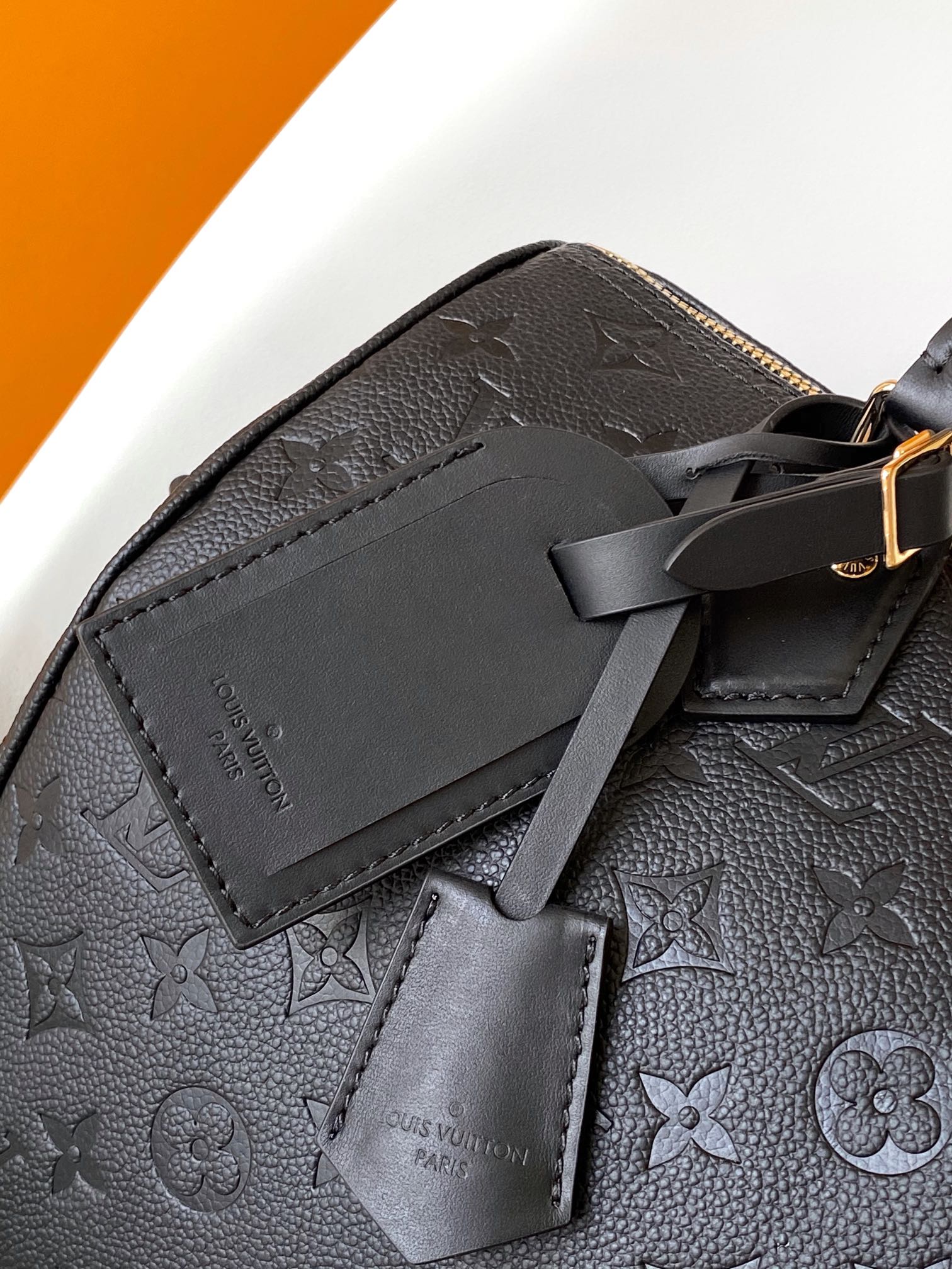 Louis Vuitton Black Embossed Leather Duffle Bag with Top Handles and Strap