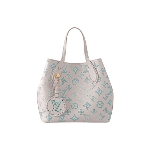Louis Vuitton Elegant Light Pink Monogram Leather Tote Bag with Charm