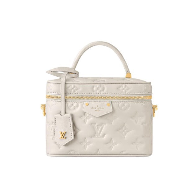 Louis Vuitton Elegant Off-White Embossed Leather Vanity Case Handbag
