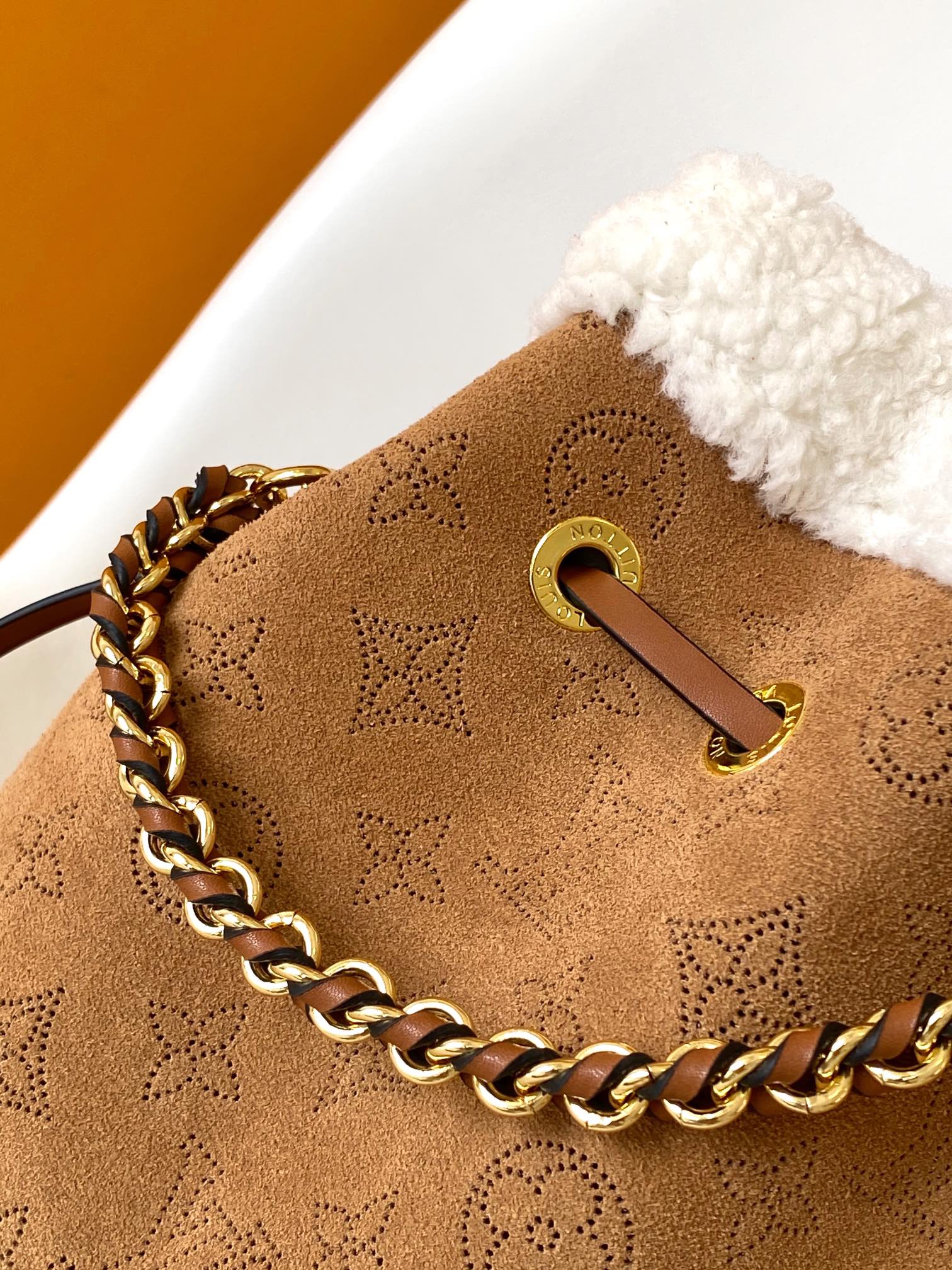 Louis Vuitton Camel Monogram Embossed Bucket Bag with Shearling Trim and Pouch