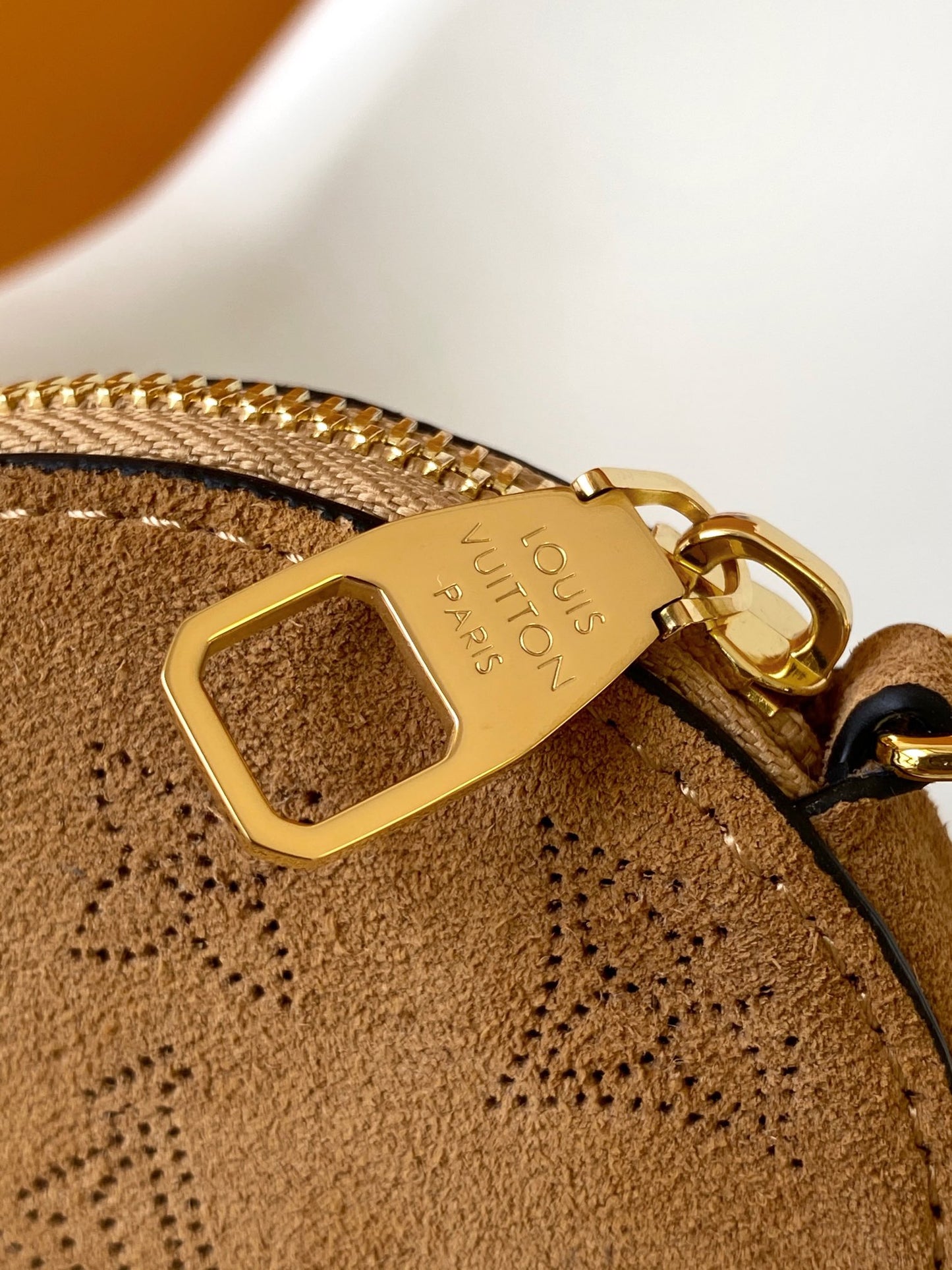 Louis Vuitton Camel Monogram Embossed Bucket Bag with Shearling Trim and Pouch