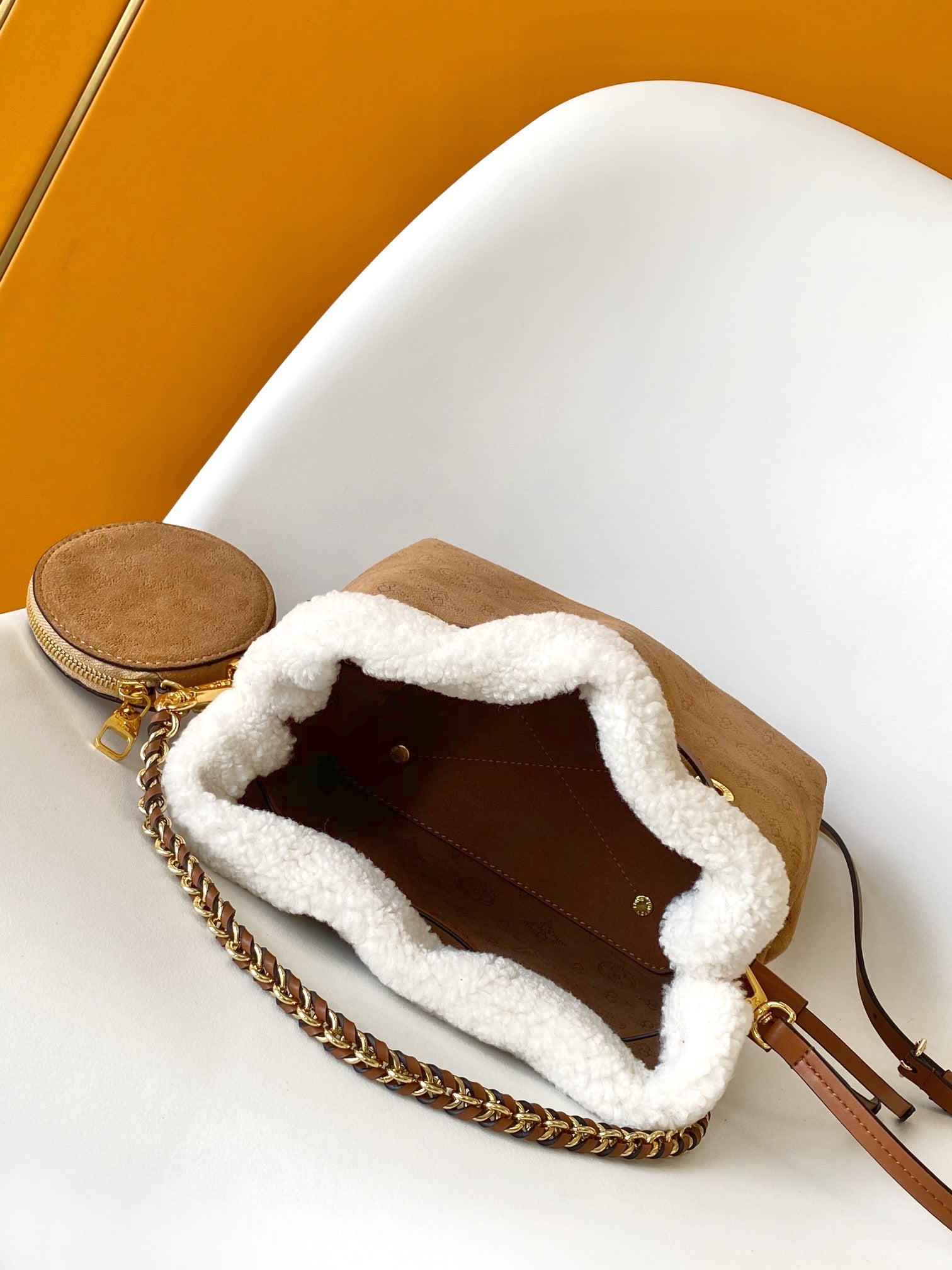 Louis Vuitton Camel Monogram Embossed Bucket Bag with Shearling Trim and Pouch