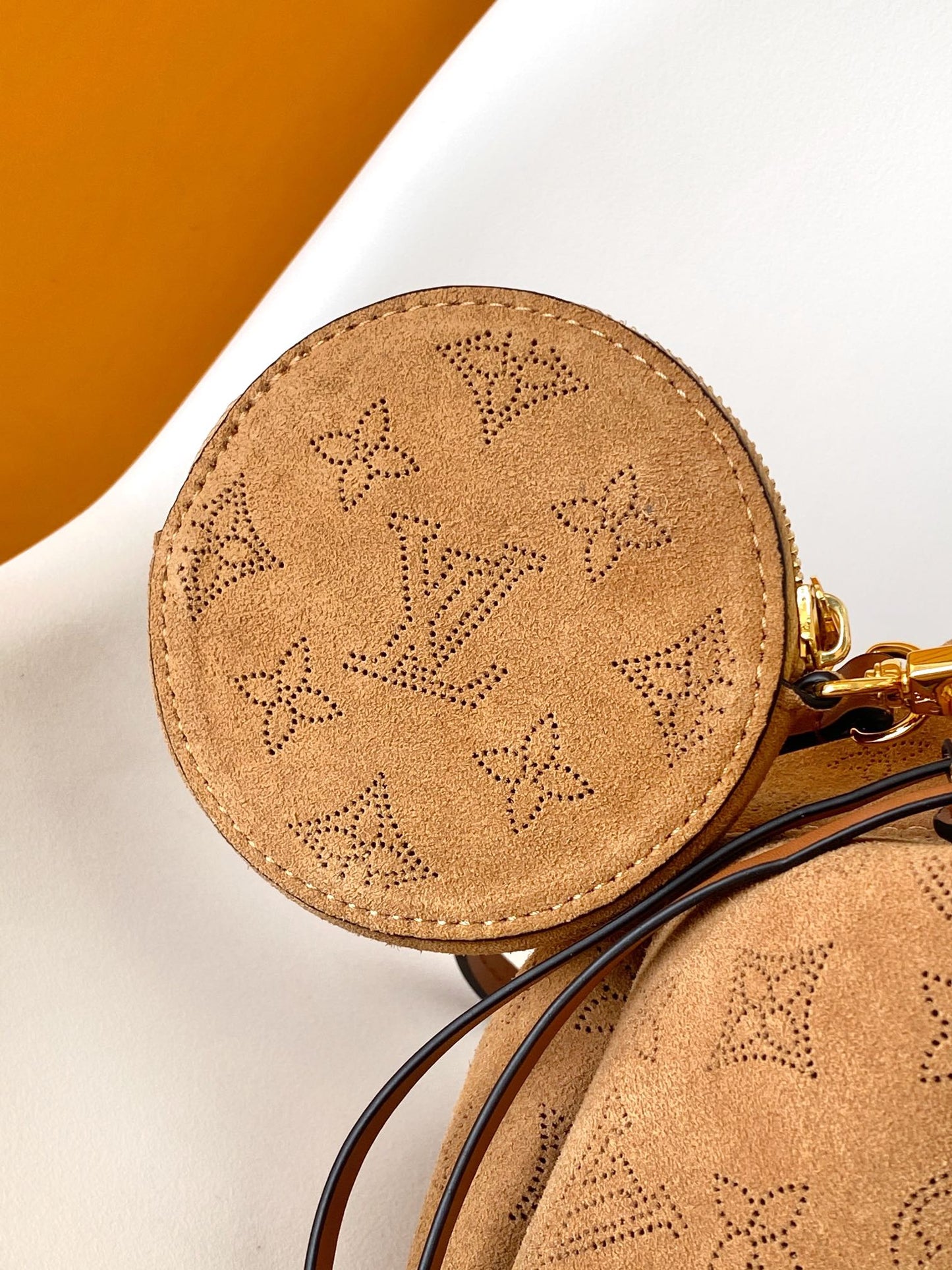 Louis Vuitton Camel Monogram Embossed Bucket Bag with Shearling Trim and Pouch