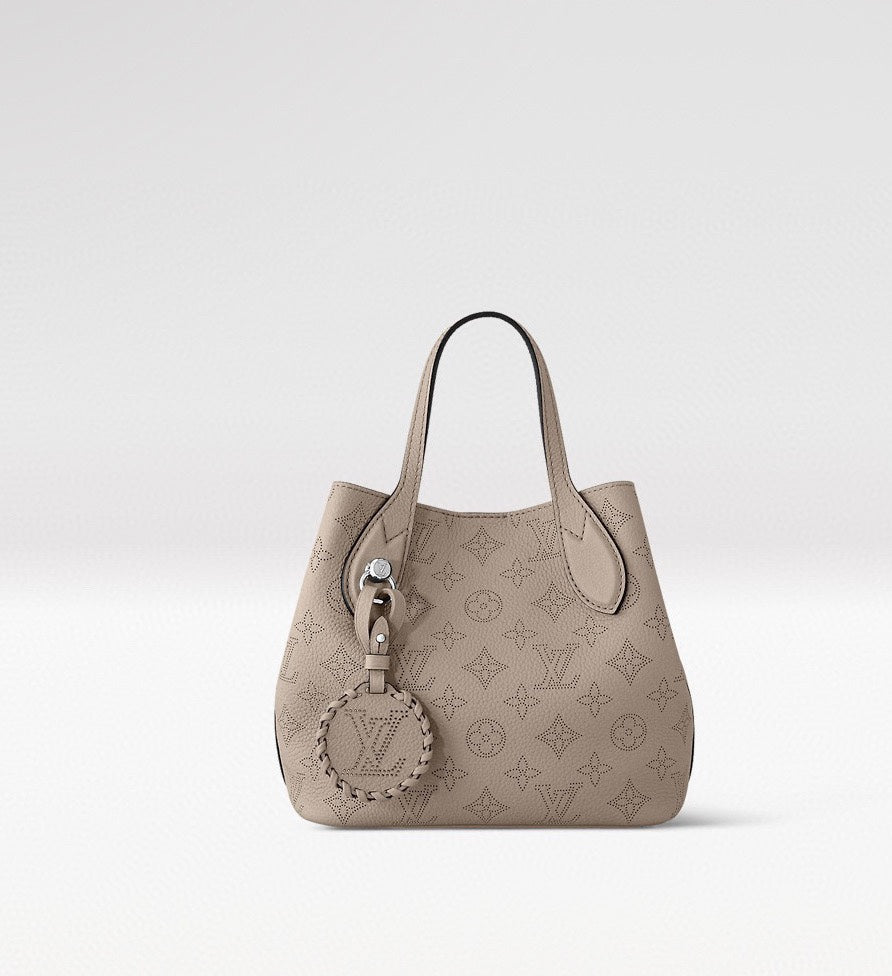 Louis Vuitton Elegant Taupe Perforated Leather Tote Handbag with Charm