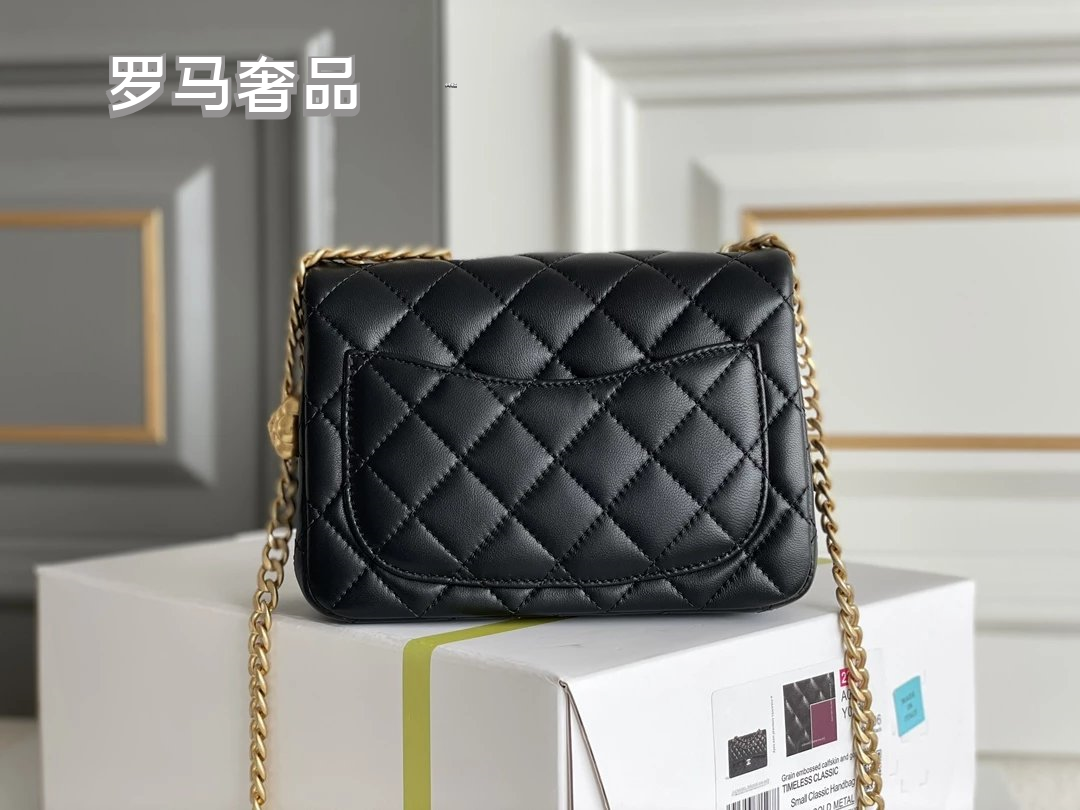 Black Quilted Leather Mini Flap Bag with Gold-Tone Chain and Camellia Charm