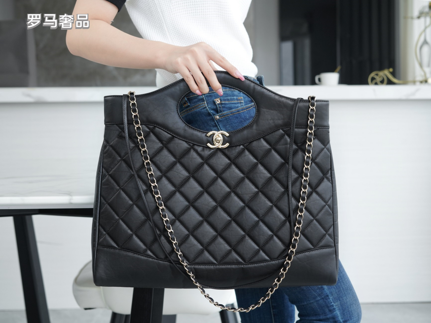Luxury Black Quilted Leather Handbag with Gold-Tone Chain Strap and Cut-Out Handles