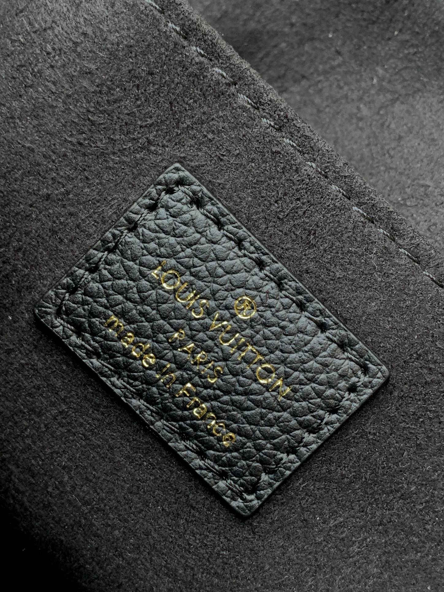 Louis Vuitton Madeleine MM Monogram Empreinte Leather Handbag - Black
