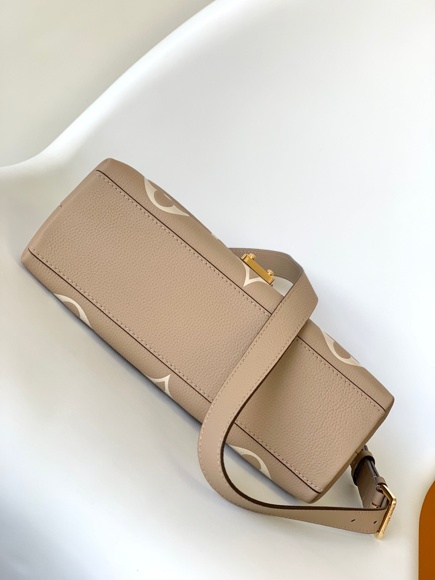 Louis Vuitton Elegant Beige Monogram Embossed Leather Top Handle Handbag