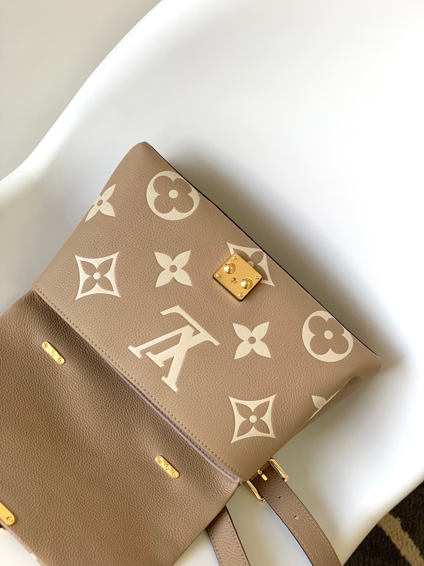 Louis Vuitton Elegant Beige Monogram Embossed Leather Top Handle Handbag