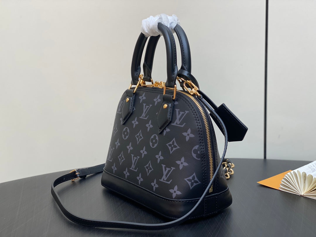 Louis Vuitton Elegant Black Embossed Leather Dome Satchel with Gold Chain
