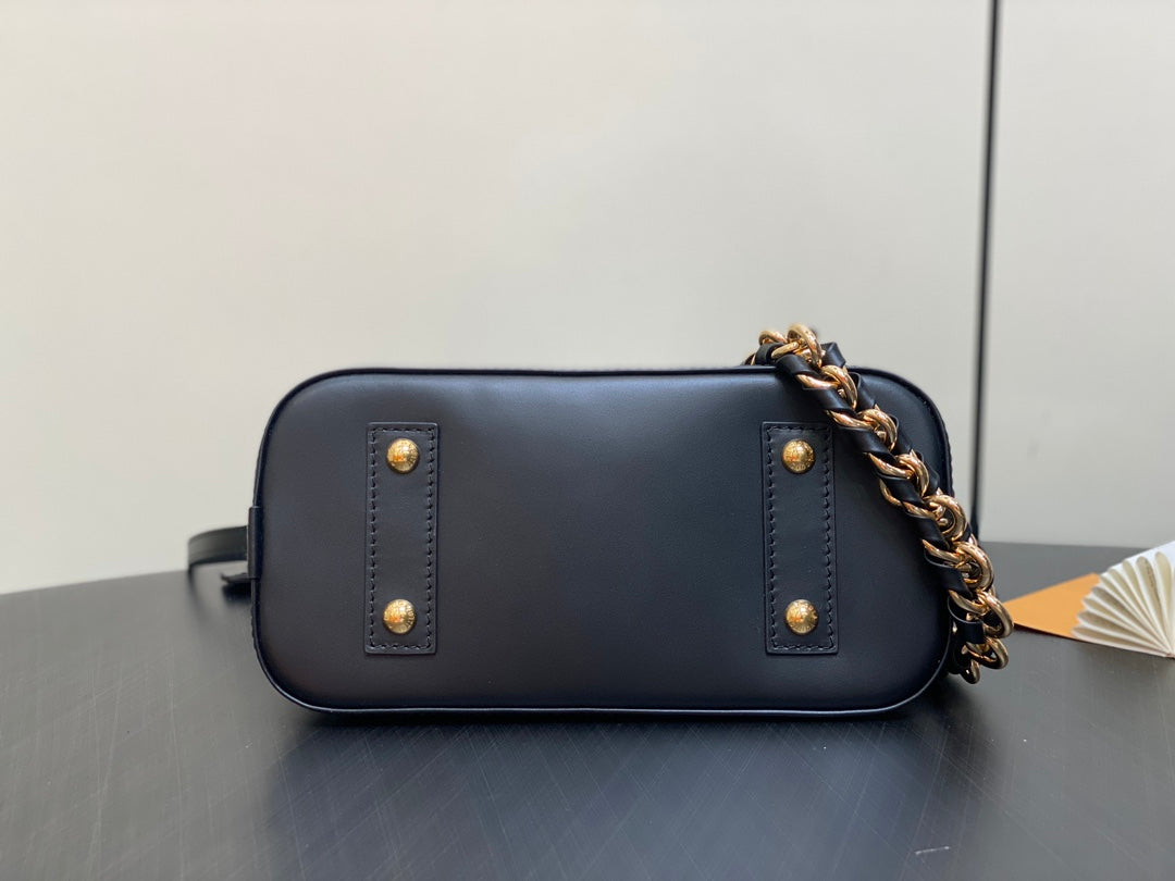 Louis Vuitton Elegant Black Embossed Leather Dome Satchel with Gold Chain