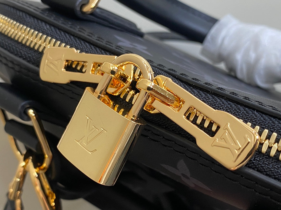 Louis Vuitton Elegant Black Embossed Leather Dome Satchel with Gold Chain