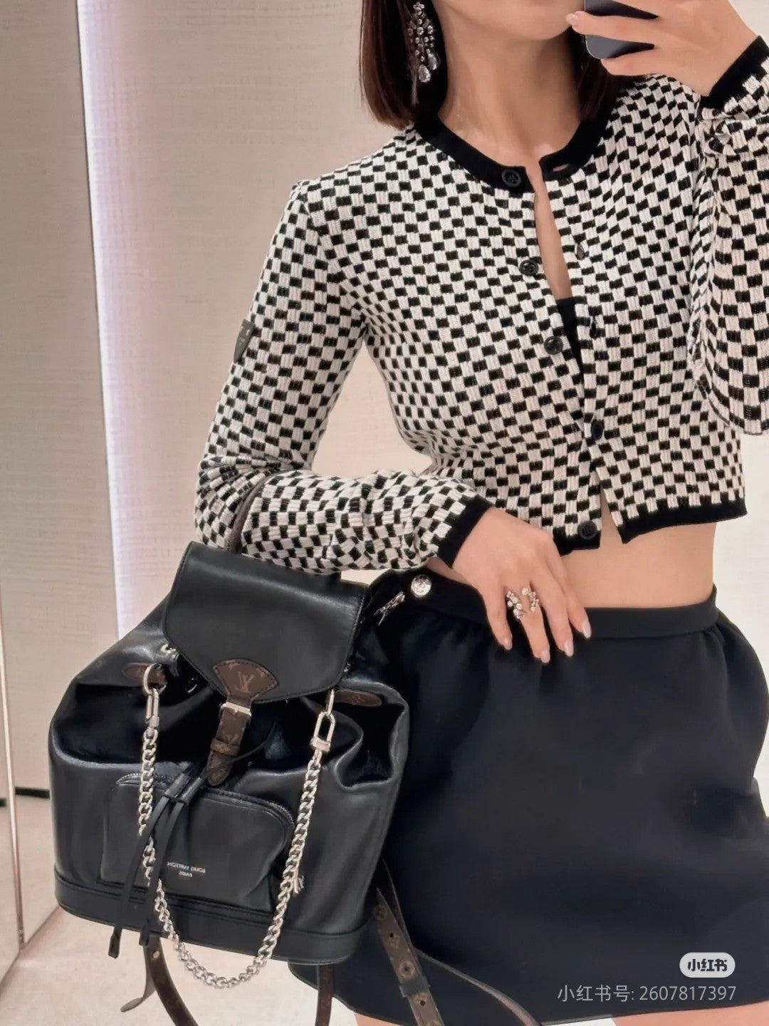 Louis Vuitton Black Leather Drawstring Backpack with Silver Chain Accent