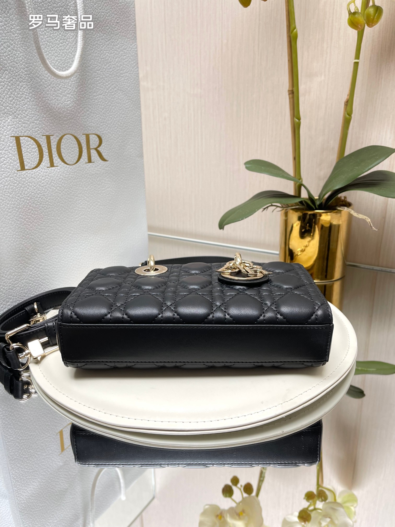 Dior Black Quilted Leather Handbag with Top Handle and Gold Chain Strap