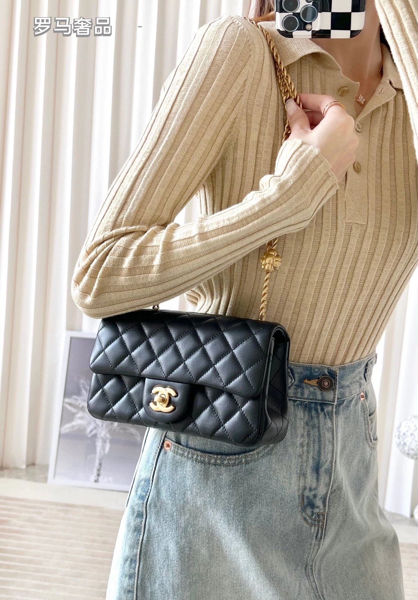 Black Quilted Leather Mini Flap Bag with Gold-Tone Chain and Camellia Charm
