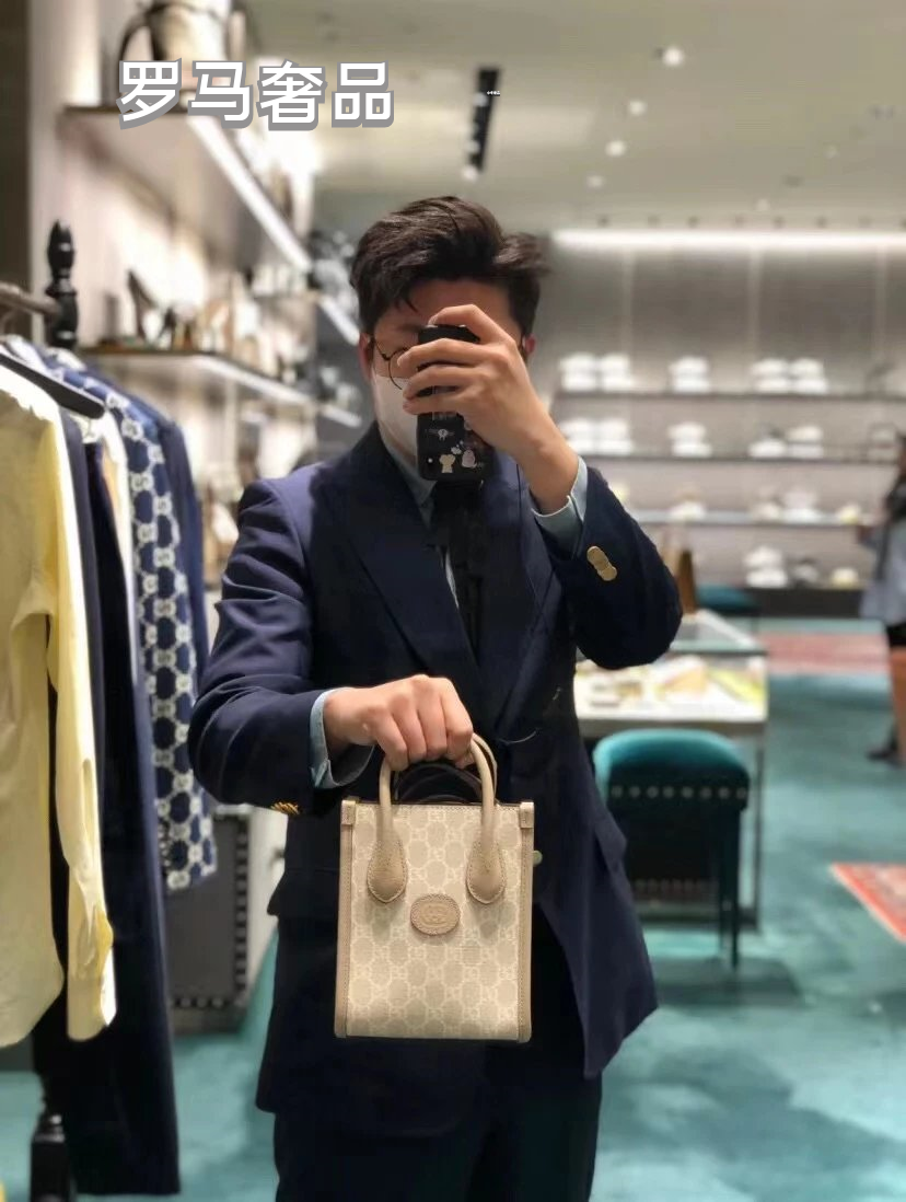 Gucci Elegant Cream Monogram Mini Tote Bag with Top Handles and Crossbody Strap