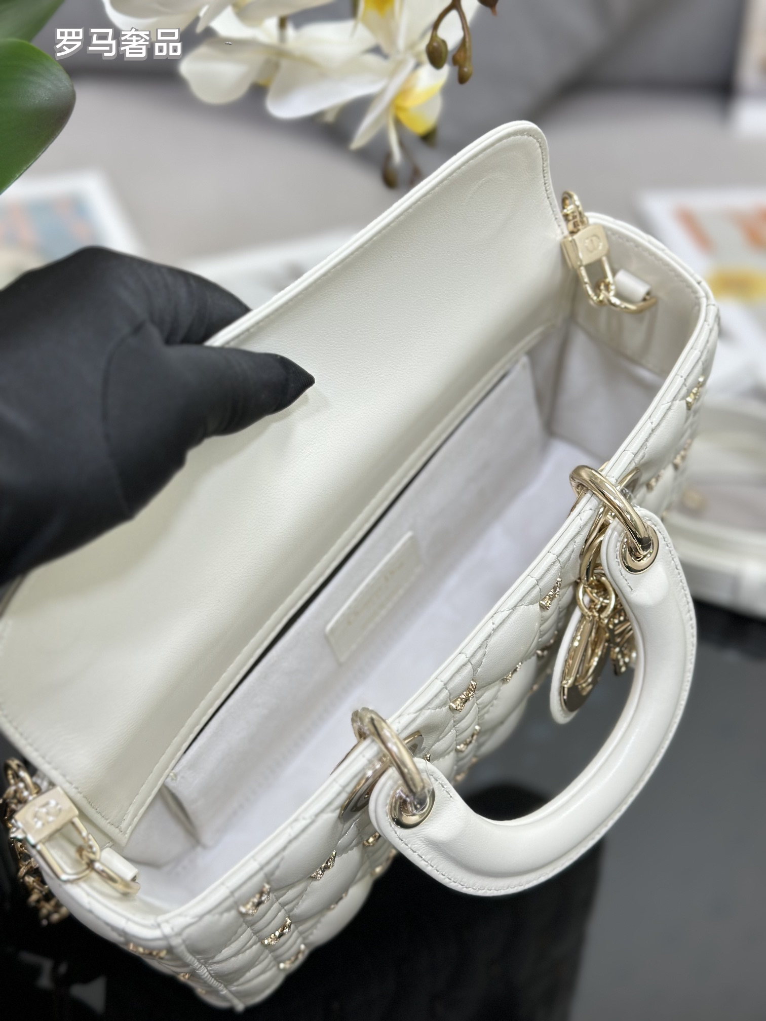 Dior Luxury Black Quilted Leather Top Handle Bag with Gold Butterfly Charm