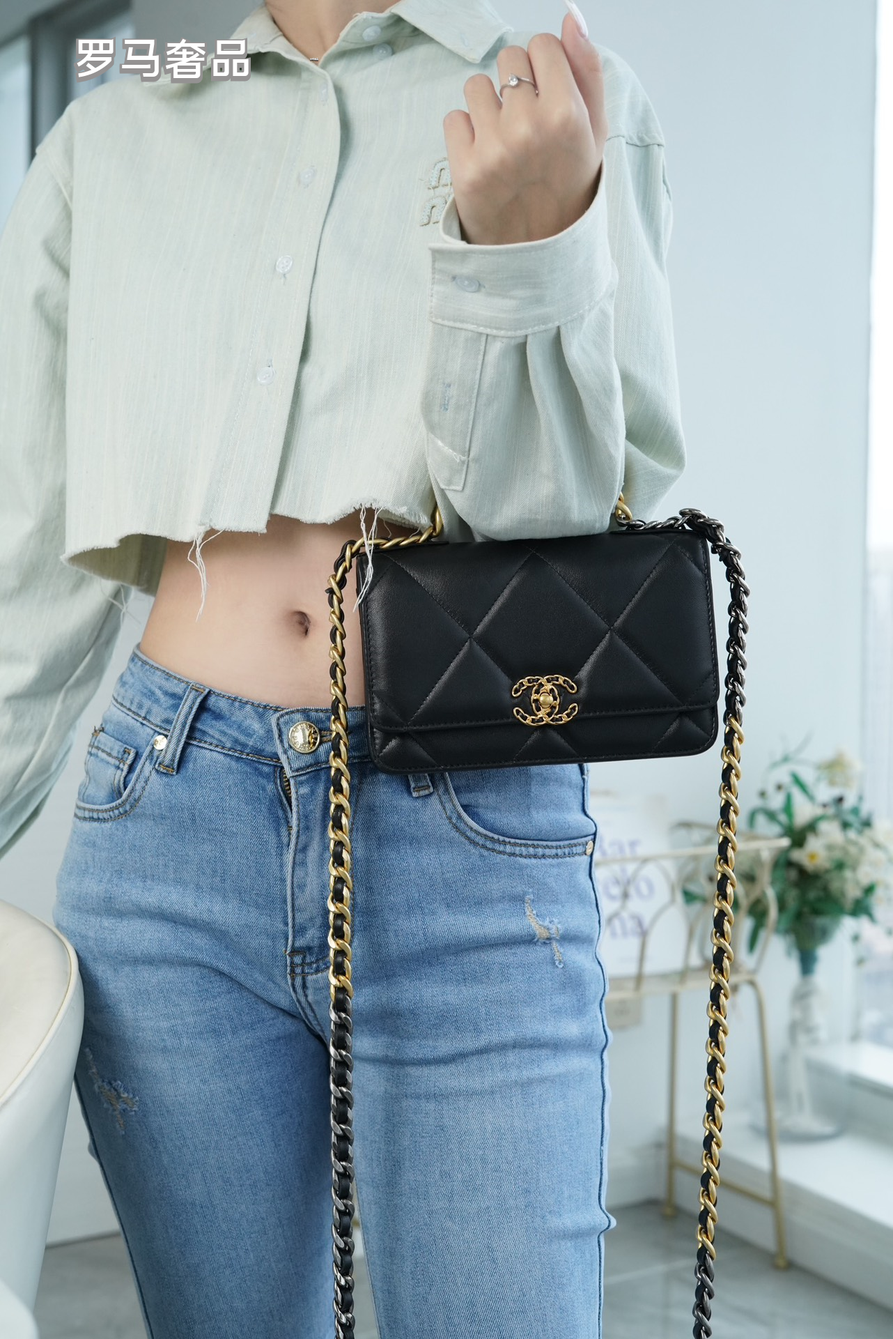 Elegant Black Quilted Leather Shoulder Bag with Gold-Tone Chain Strap