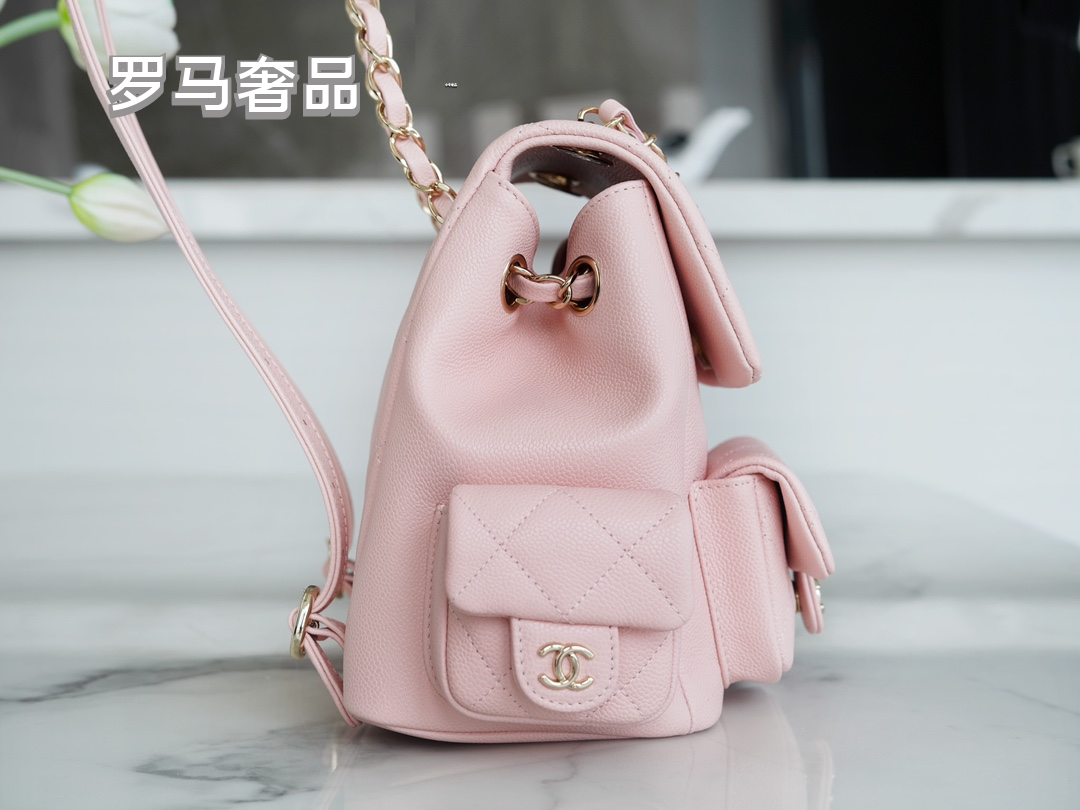 Chanel Quilted Pink Leather Backpack with Gold-Tone CC Logo