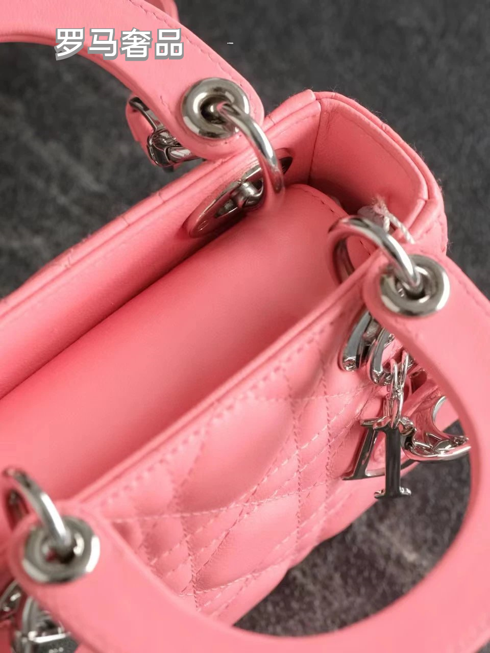 Dior Elegant Pink Quilted Leather Mini Handbag with Top Handle and Strap